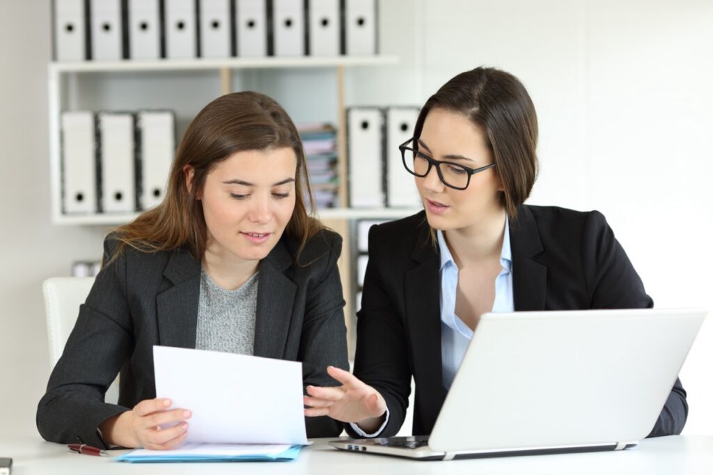 IDD billing coordinator reviewing claim denial root causes and authorization utilization data in the Vertex Billing Manager dashboard