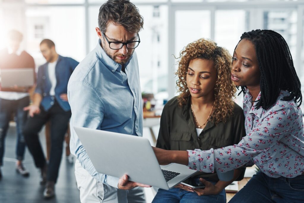 IDD agency finance director reviewing month-end billing reconciliation, A/R aging report, and authorization utilization summary in Vertex Billing Manager dashboard