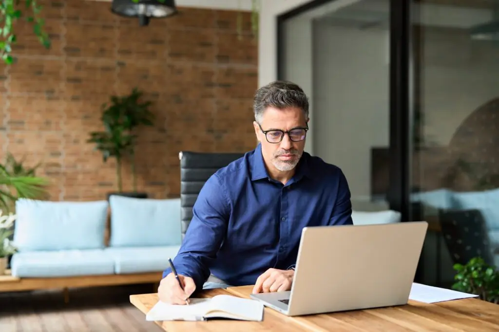 IDD agency executive director reviewing real-time financial performance, staff scheduling, and client outcome data across integrated Vertex Systems billing and case management platform