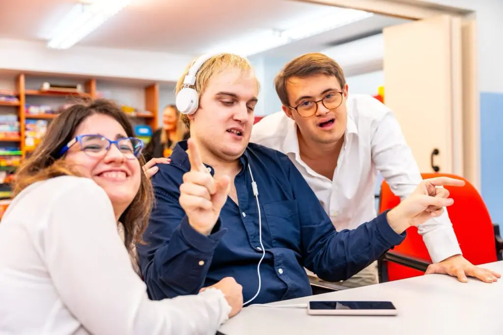 Direct support professional helping a client with intellectual and developmental disabilities in the community